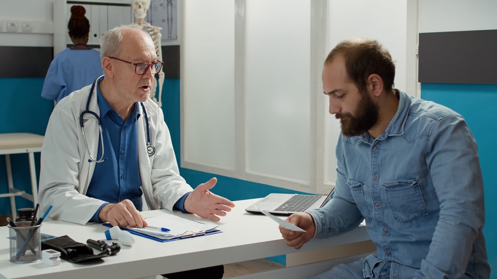 Healthcare professional discussing prostatitis treatment with a man