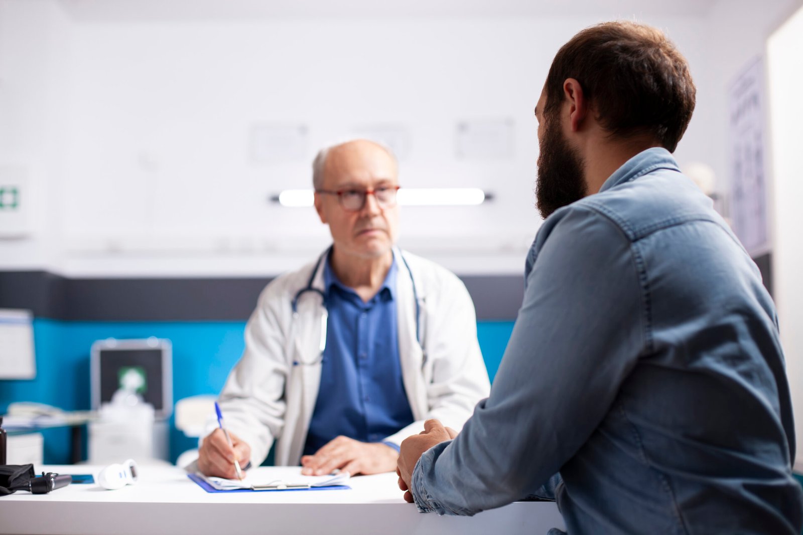 Man discussing prostate symptoms with a healthcare professional